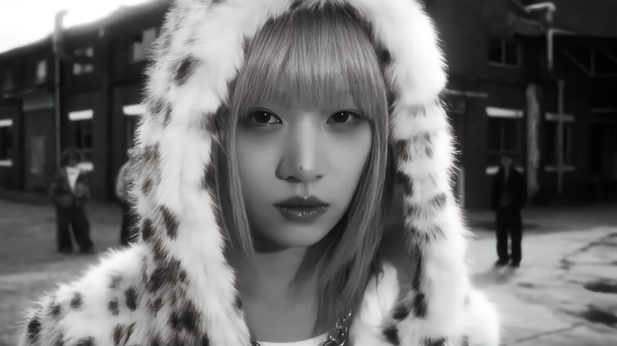 A member of KIVITZ, AOMG's first girl crew, in a teaser image ahead of their debut