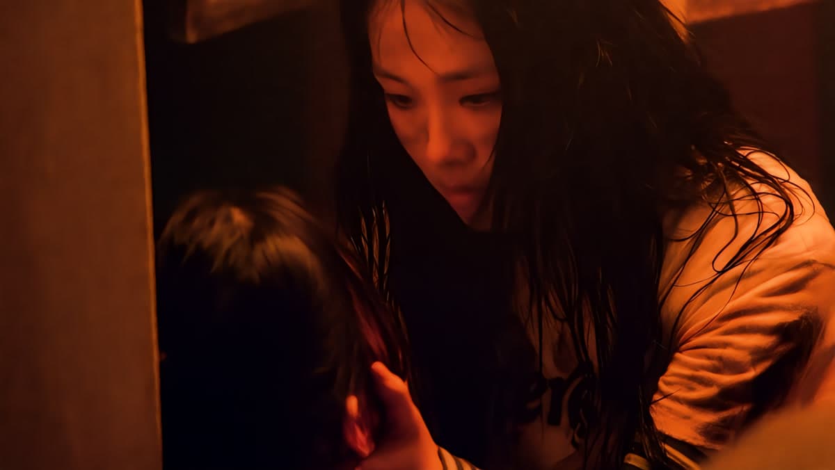 BIBI in a cinematic MV shoot capturing the bold, intense visual style that defines her artistry