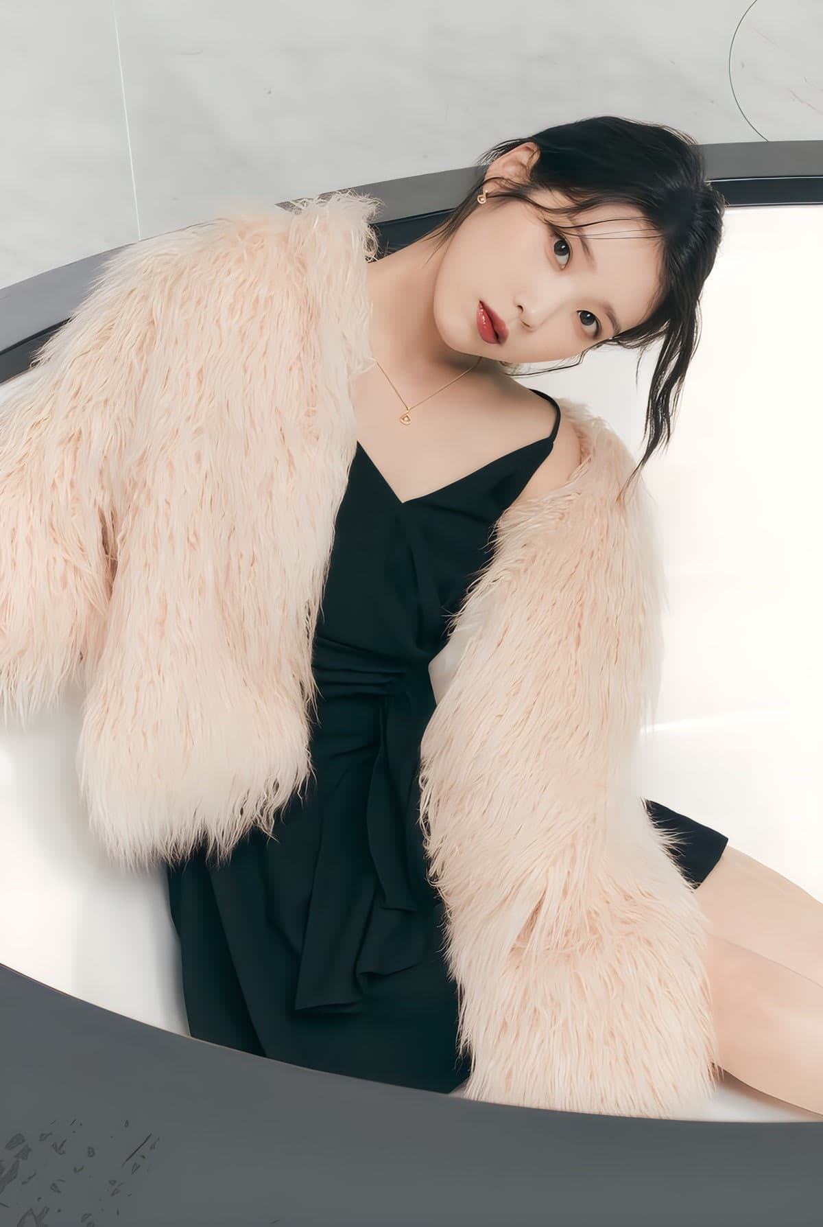 IU photographed in a recent shoot — the singer-actress turned 33 on May 16, 2026