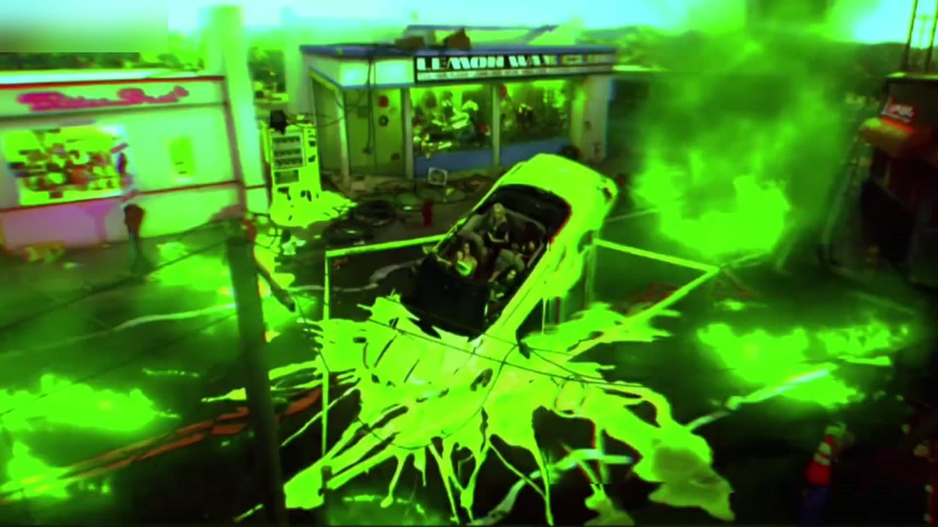 A neon-toned frame from aespa’s official LEMONADE preview content captures the album’s sharp visual mood.