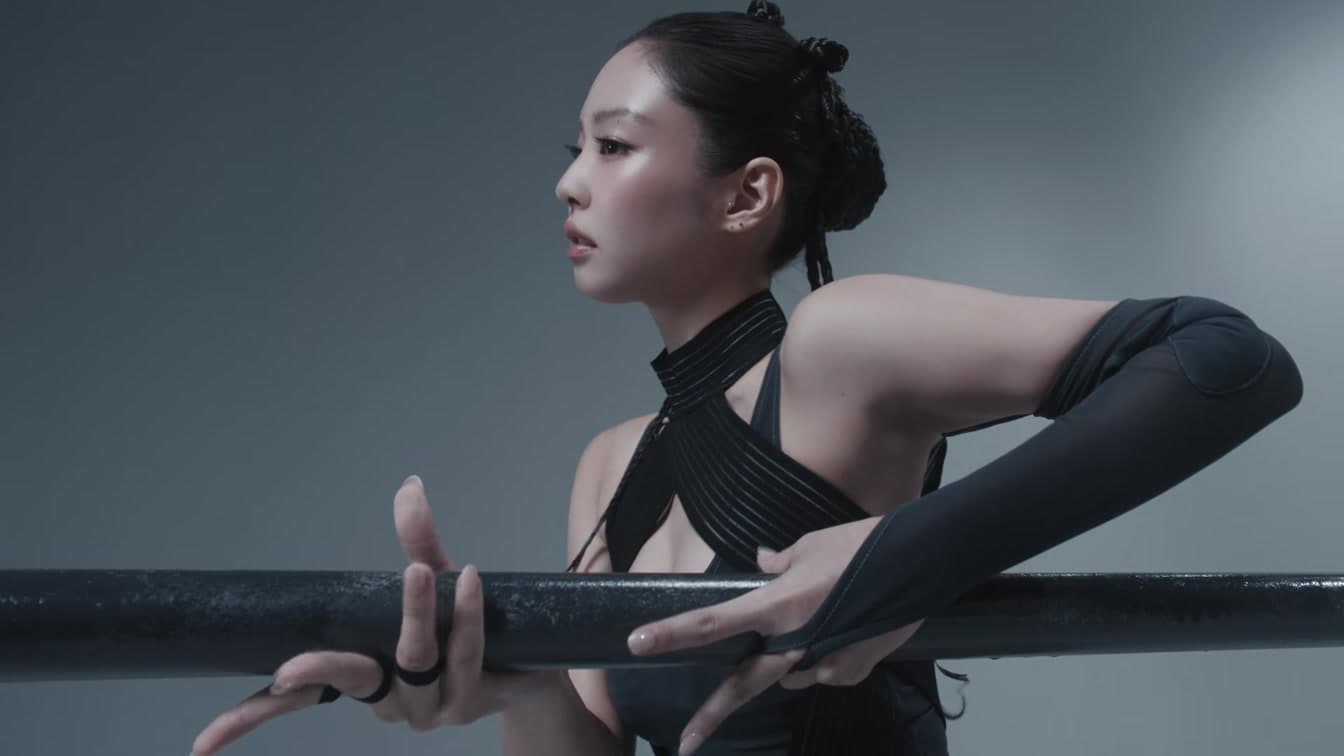 A BLACKPINK member in a powerful pose from the 'GO' official music video — YouTube: BLACKPINK