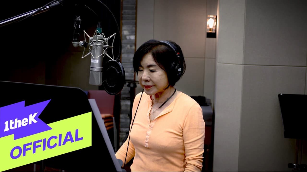 Choi Jin-hee announces Who Is It in the official teaser thumbnail shared by 1theK.