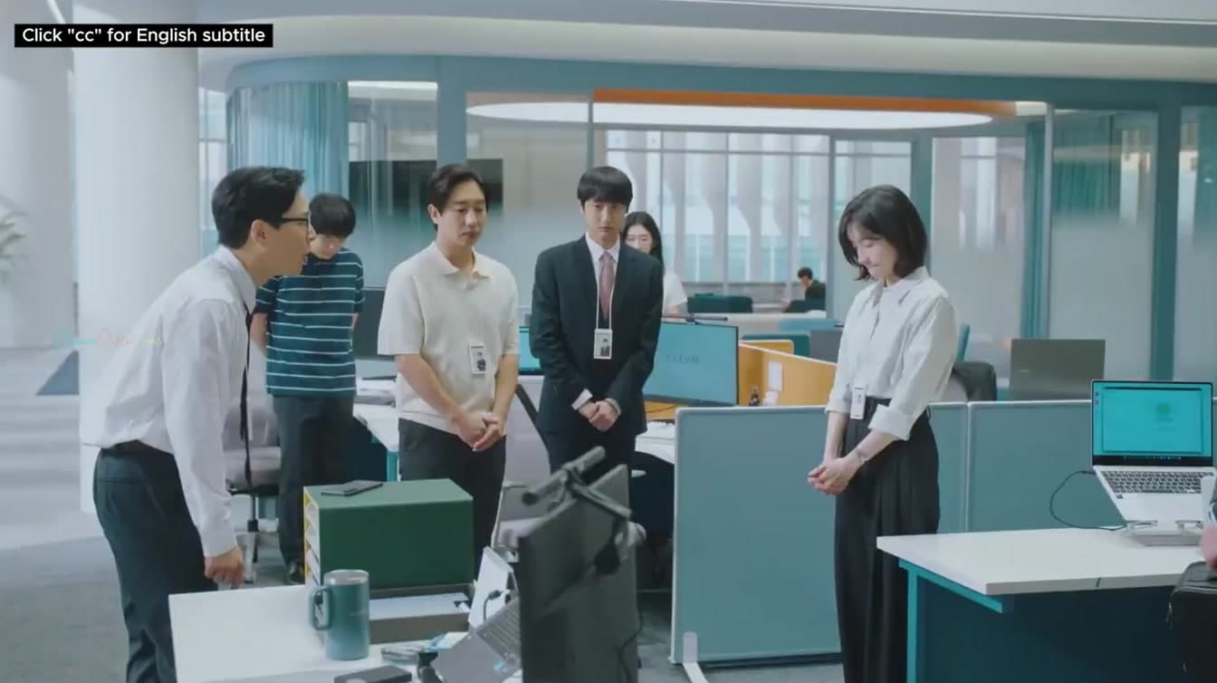 A scene from the trailer for See You at Work Tomorrow, the tvN office romance introducing Kang Mi-na's new screen chapter.
