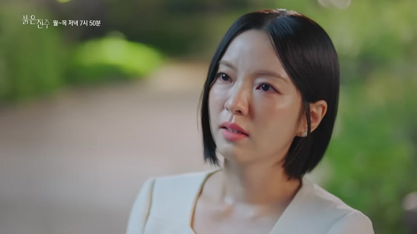 A tense moment from KBS2's Red Pearl preview reflects the drama's escalating revenge battle inside Adel Group.