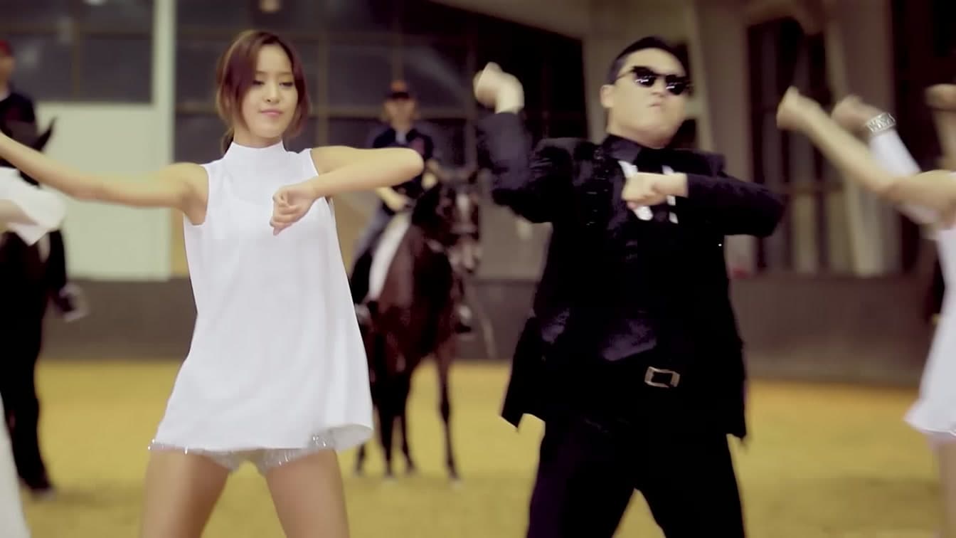 PSY performing the iconic horse-riding dance in the official 'Gangnam Style' music video — YouTube: officialpsy
