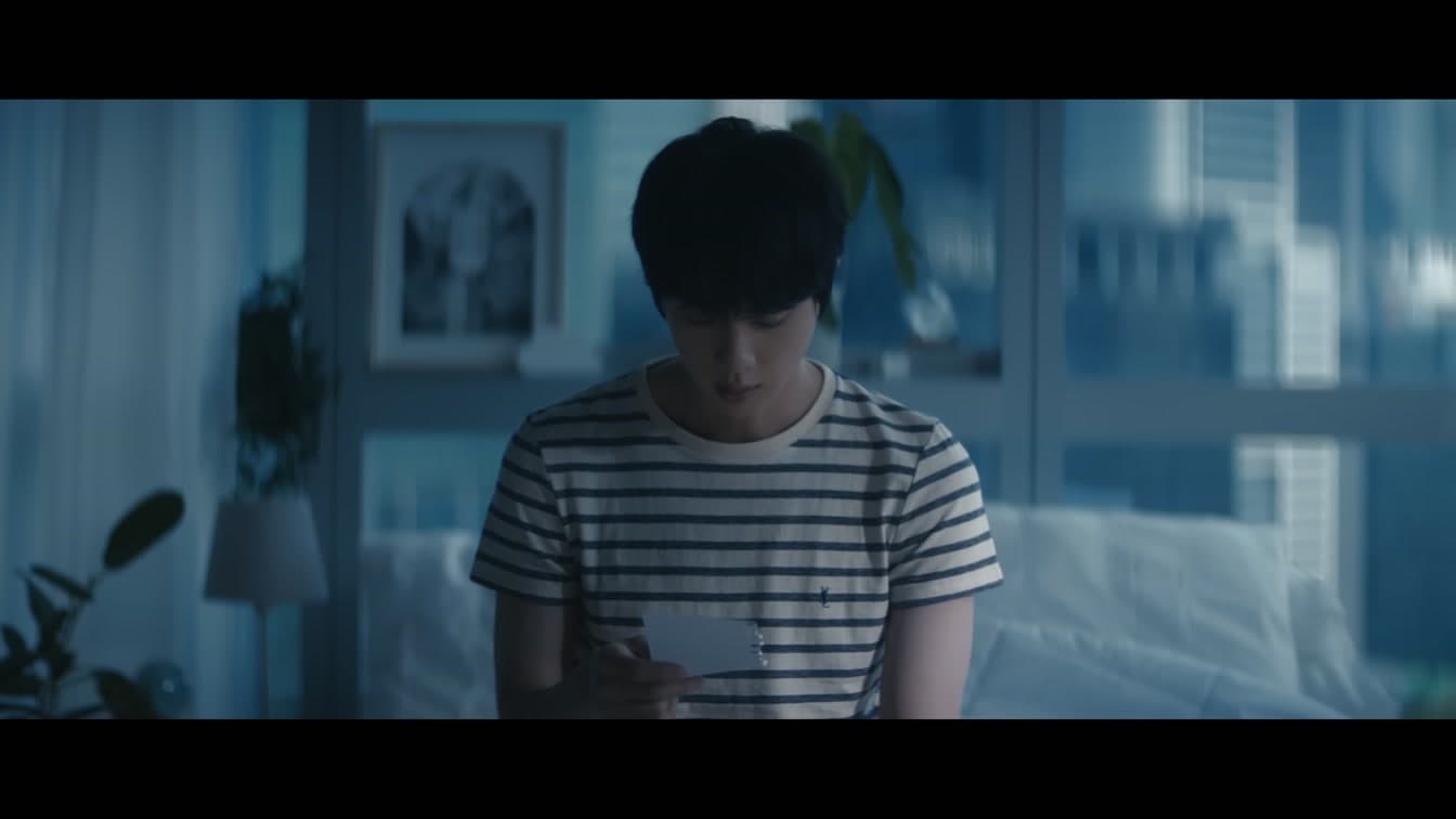 BTS's Jin appears in a scene from his music video 'Don't Say You Love Me' — YouTube: HYBE LABELS