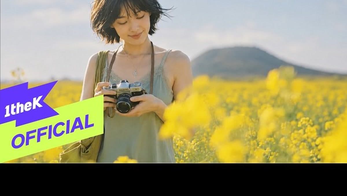 TRAVELLER's "Tangerine Night" MV thumbnail from the official 1theK YouTube upload.